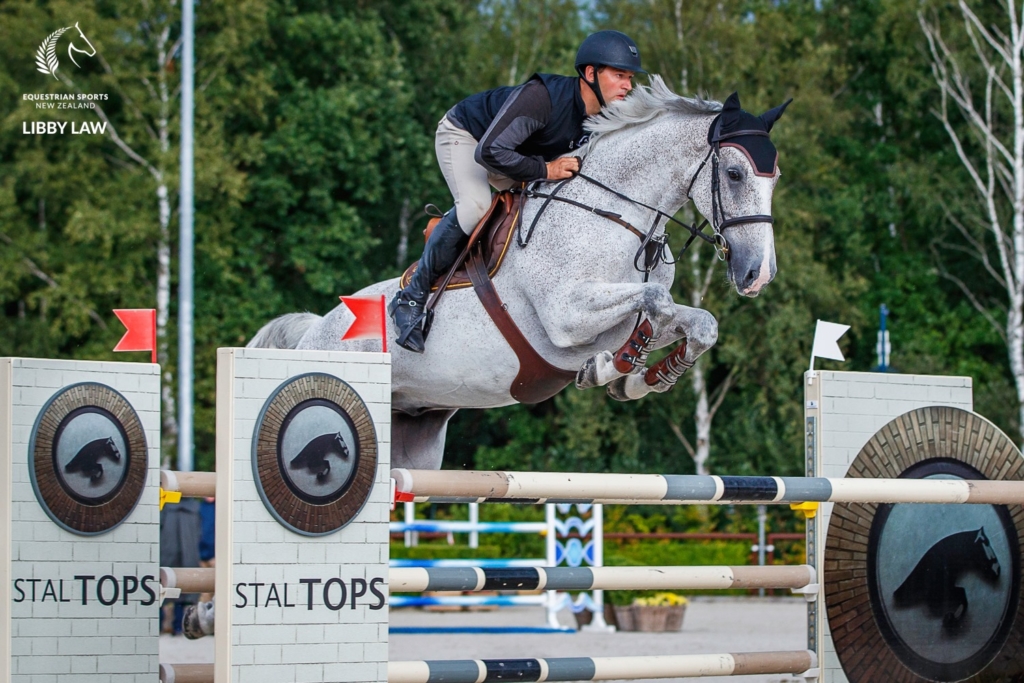 Tom Tarver and Popeye during the training round of the FEI Olympic Qualifier for Team Jumping - Group G. Photo Credit Libby Law